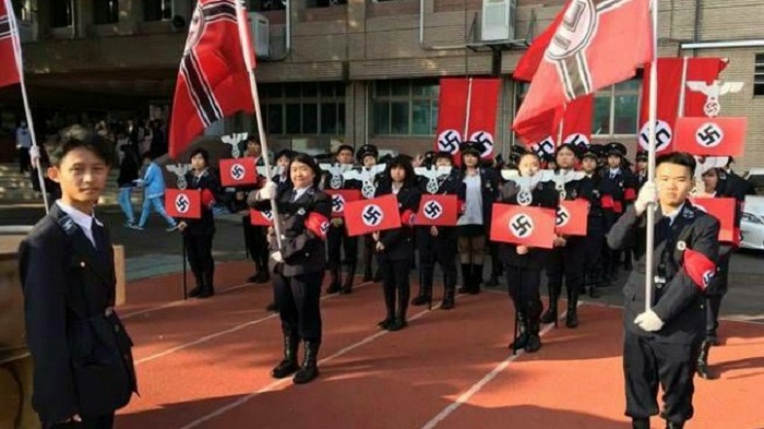 Principal of Taiwan school resigns over Nazi-themed parade 